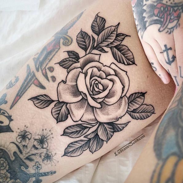 Dotwork rose on thigh by Phil Tworavens