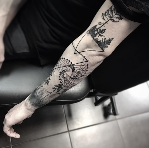 Creative sleeve tattoo by Sara Reichardt