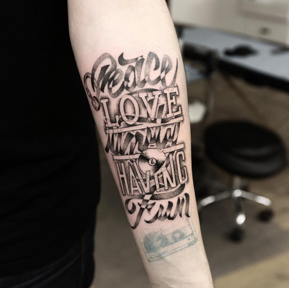 Dotwork typography tattoo by Maksim Lopez
