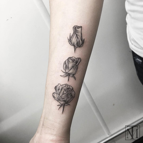 Blossoming rose tattoo by Marlon M Toney