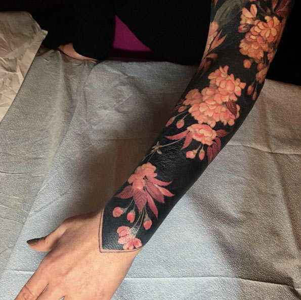 Heavy blackwork sleeve with pink flowers by Esther Garcia