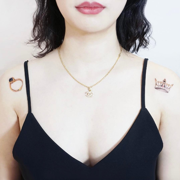 Crown and ring tattoos by Heejae Jung