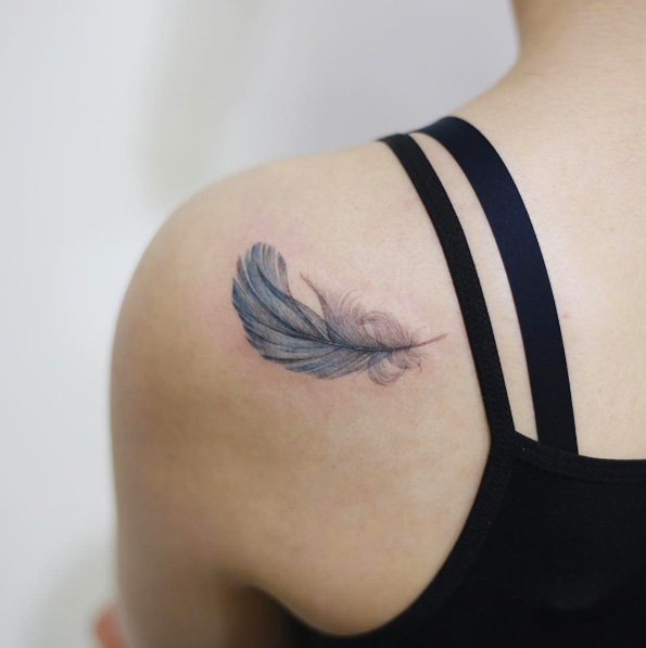 Blue feather tattoo by Doy