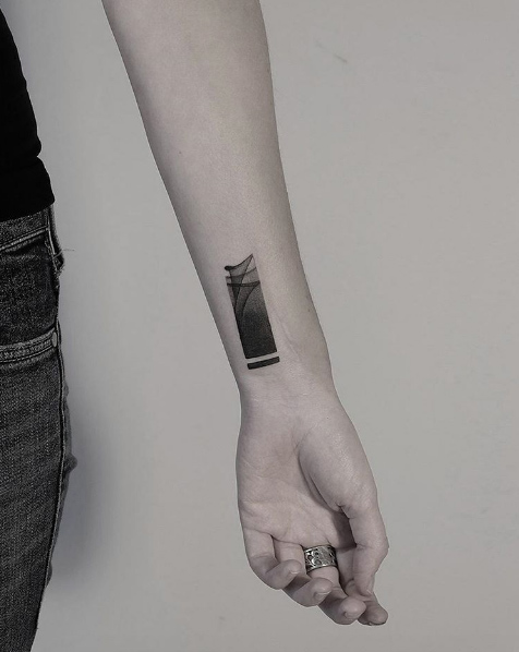 Smokey wrist tattoo by Roman Melnikov