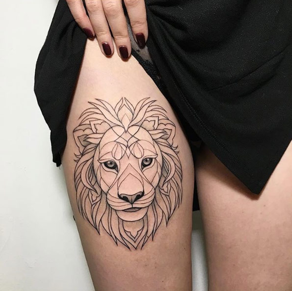 Lion tattoo on thigh by Ira Shmarinova