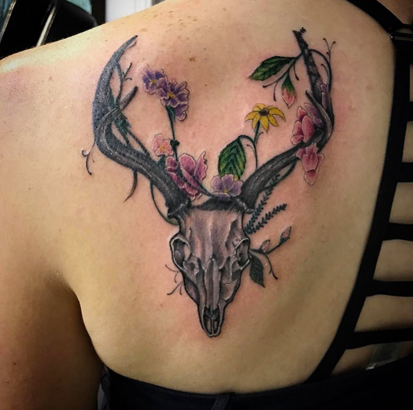 Floral skull by The Black Rooster