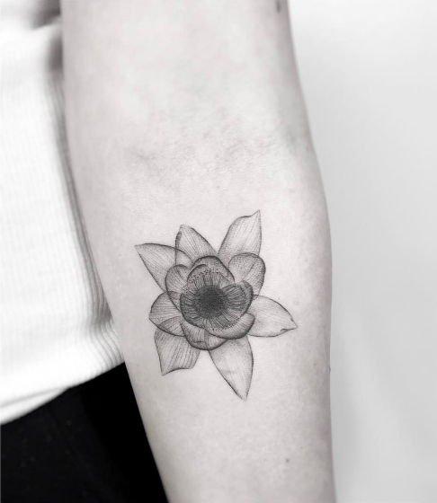 X-Ray flower tattoo by Jakub Nowicz