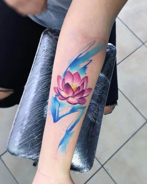 Lotus flower tattoo by Adrian Bascur