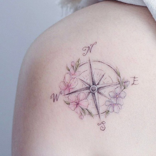 Elegant floral compass tattoo by Mini Lau