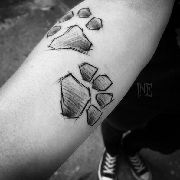 Sketch style paw print tattoos by Inez Janiak
