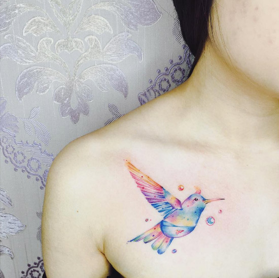 Beautiful hummingbird tattoo by Suantsai