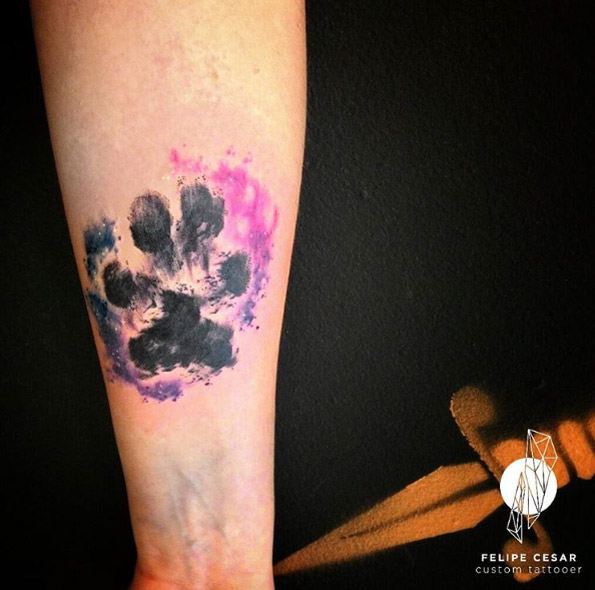 Pink and black paw print tattoo by Felipe Cesar