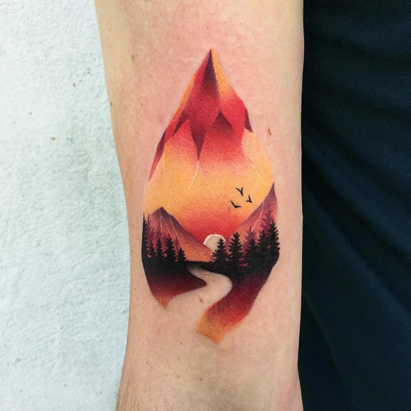 Colorful and creative mountain tattoo by Daria Stahp