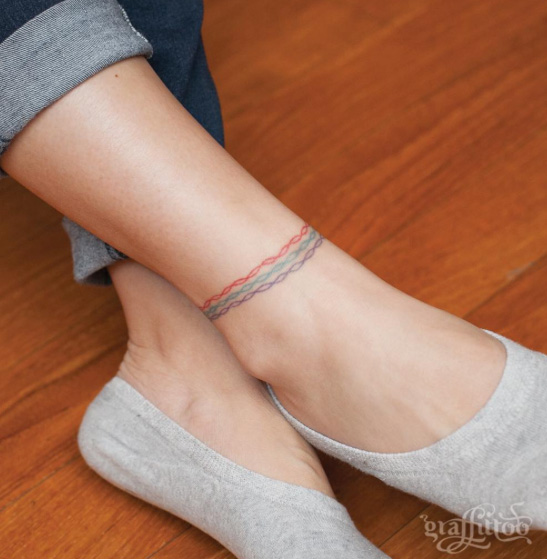 Cool anklet tattoo by Tattooist River