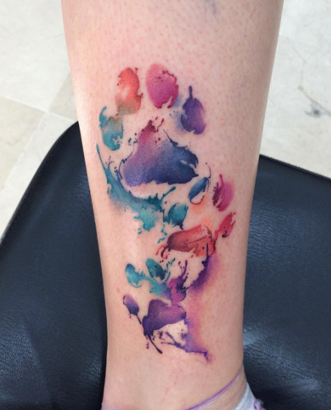 Watercolor leg piece by Trix Tattoo