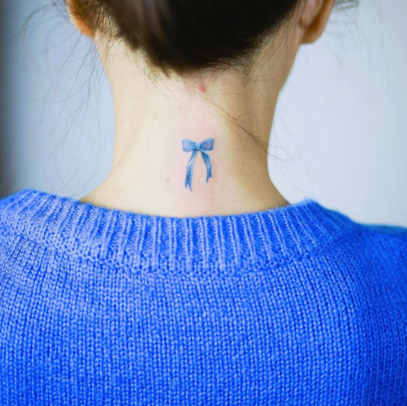 Blue ribbon tattoo by Nando