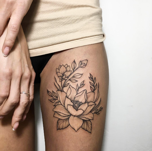 Black ink floral thigh piece by Ira Shmarinova