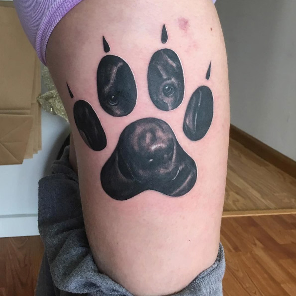 Paw print tattoo by NorCal Tattoo