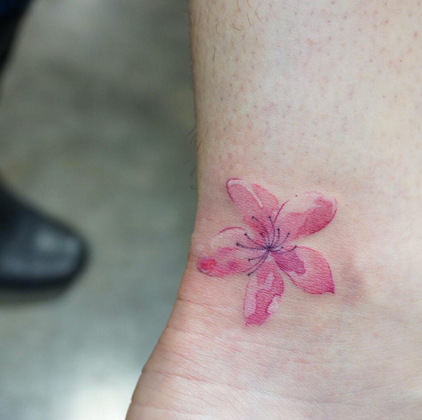 Beautiful cherry blossom tattoo by G.NO