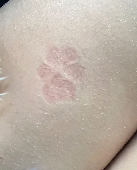 White ink paw print tattoo via Retroivi 
