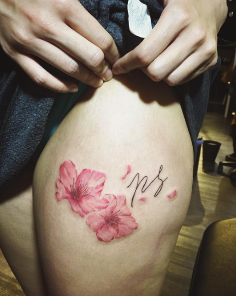 Sakura thigh tattoo by NumaAn