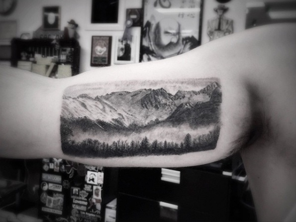 Mountain range tattoo by Doctor Woo