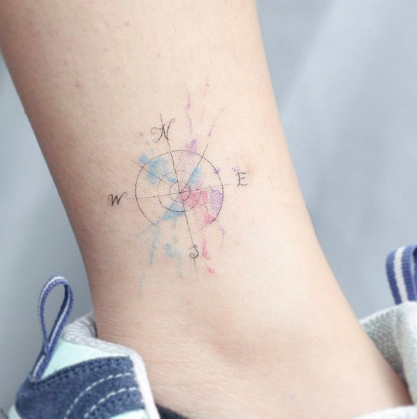 Watercolor compass tattoo by Mini Lau