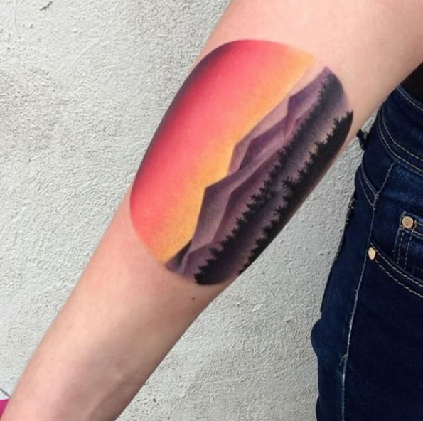 Mountain sun rise tattoo by Daria Stahp