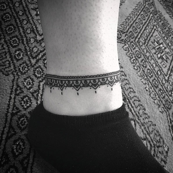 Ornamental anklet tattoo by Barb Rebelo