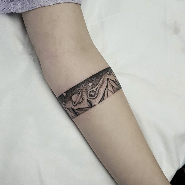 Space/mountain armband tattoo by Ben Doukakis