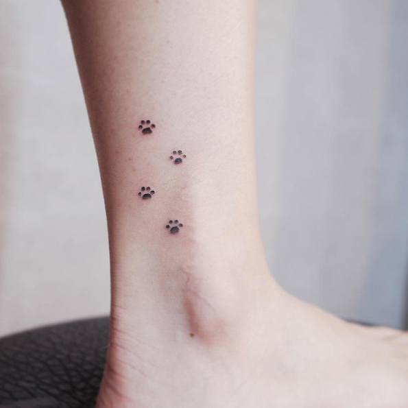 Paw print tattoos by Witty Button