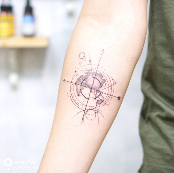 Global compass tattoo by Silo