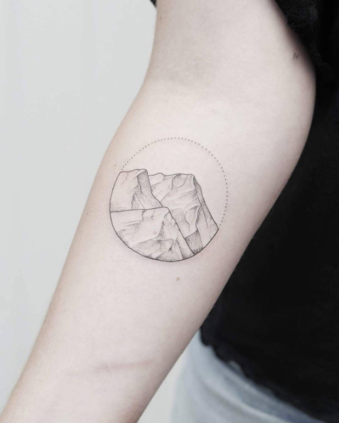 Soft mountain range tattoo by Phoebe Hunter
