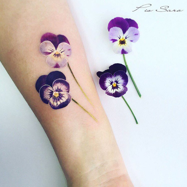 Realistic pansy tattoo by Pis Saro