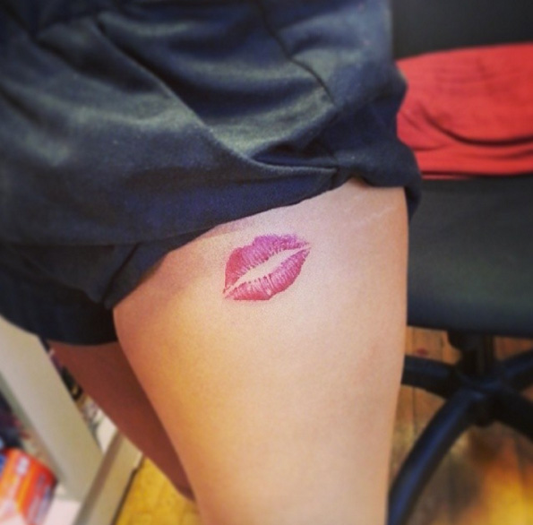 Pink lipstick tattoo by Jay Shin