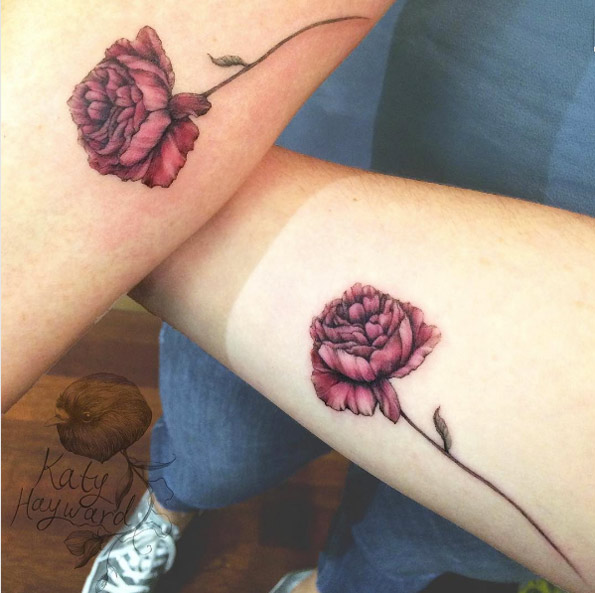 Matching red roses by Katy Hayward