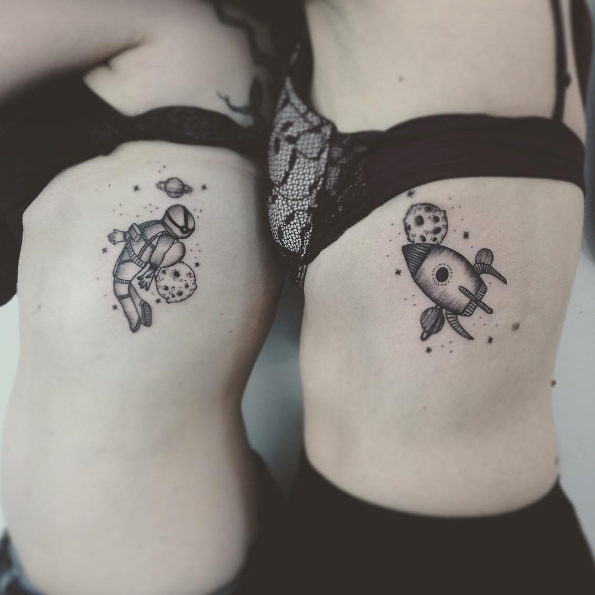 Matching space tattoos by Milena