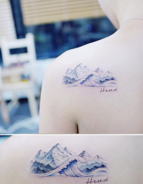 Mountains and a wave by Tattooist Banul