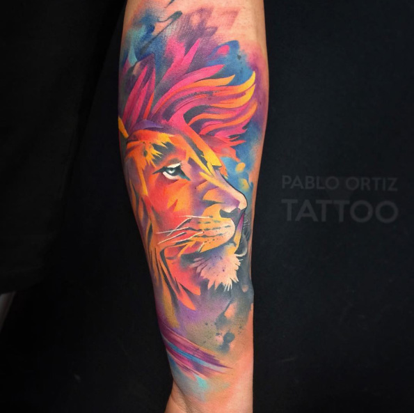 Colorful lion tattoo by Pablo Ortiz