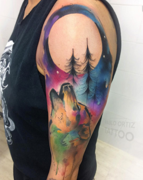 Watercolor wolf tattoo by Pablo Ortiz