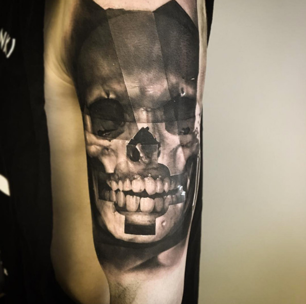 Black and grey ink skull by David Rinklin
