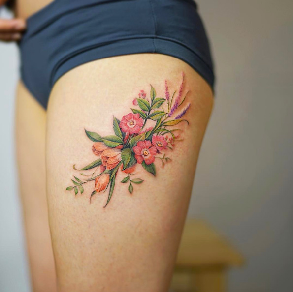 Stunning floral thigh piece by Nando