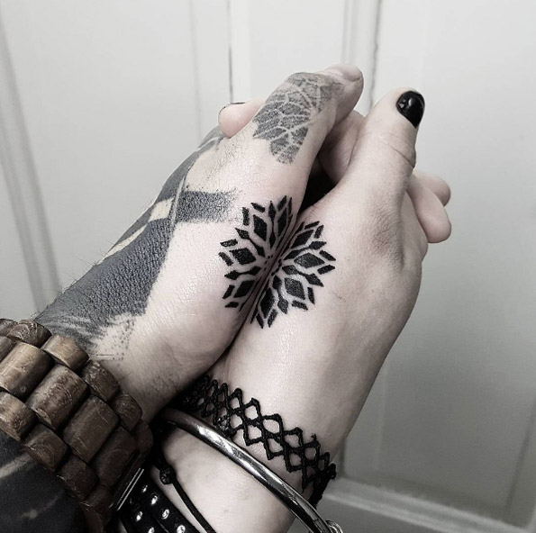 Mandala couple tattoo by Matteo Nangeroni