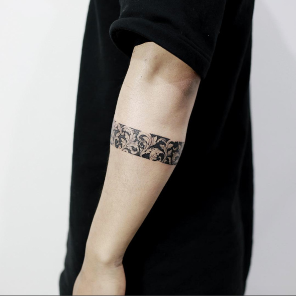 Armband cover-up by Tattooist Doy