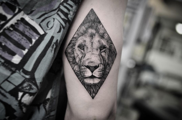 Lion tattoo by Chris Jones