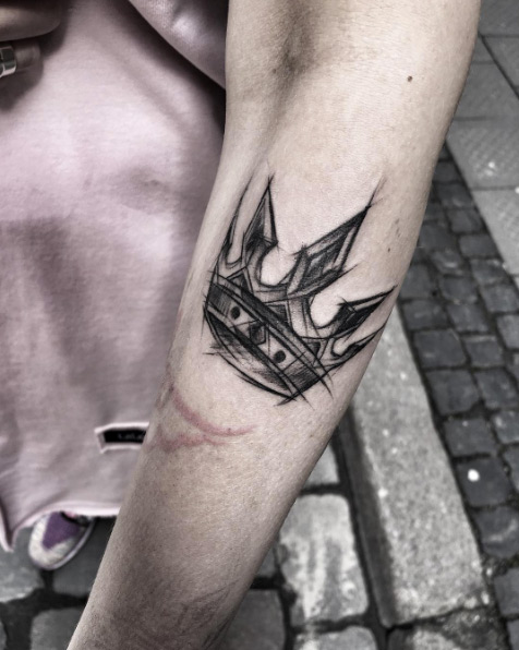 Sketched crown tattoo by Inez Janiak