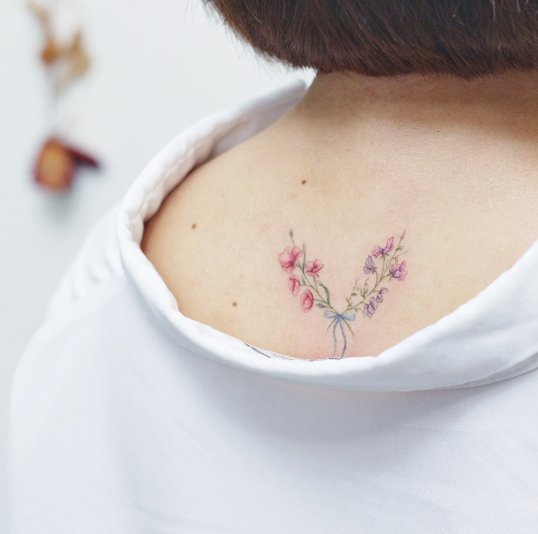 Pretty floral back piece by Mini Lau
