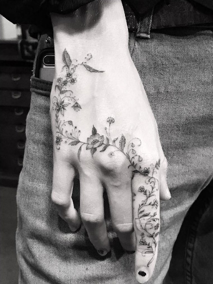 Floral hand piece by Dr. Woo