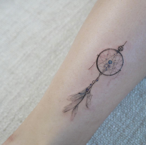 Elegant dreamcatcher tattoo by Tattooist Flower