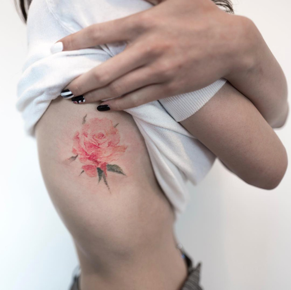 falling petals tattoo